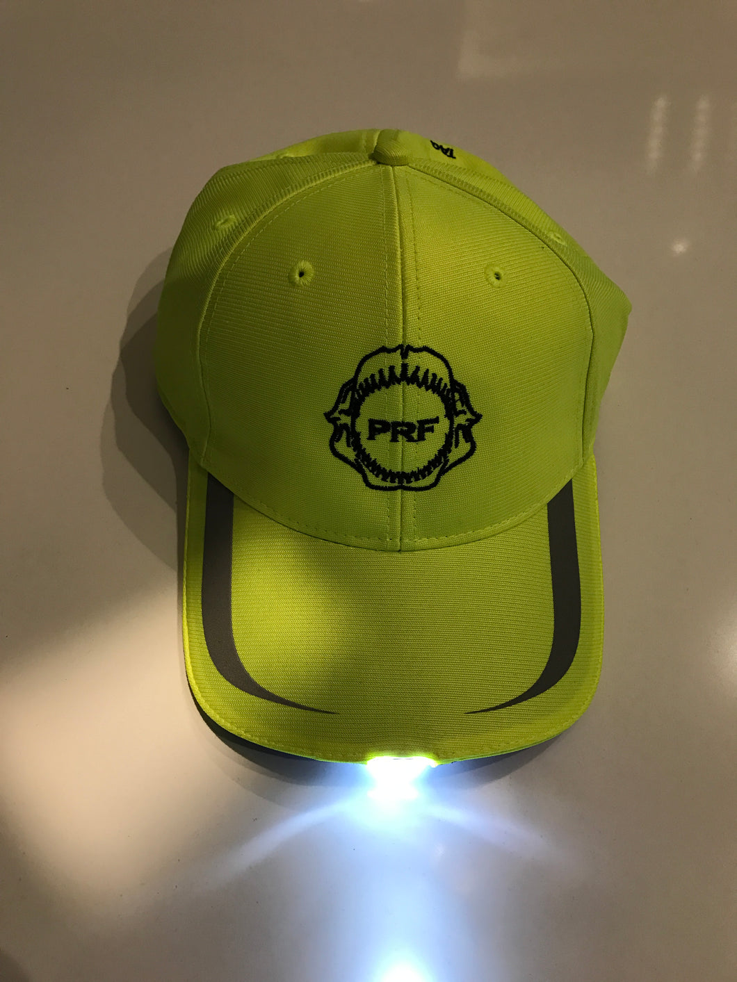 Pre-Order Neon green hat with a built in flashlight