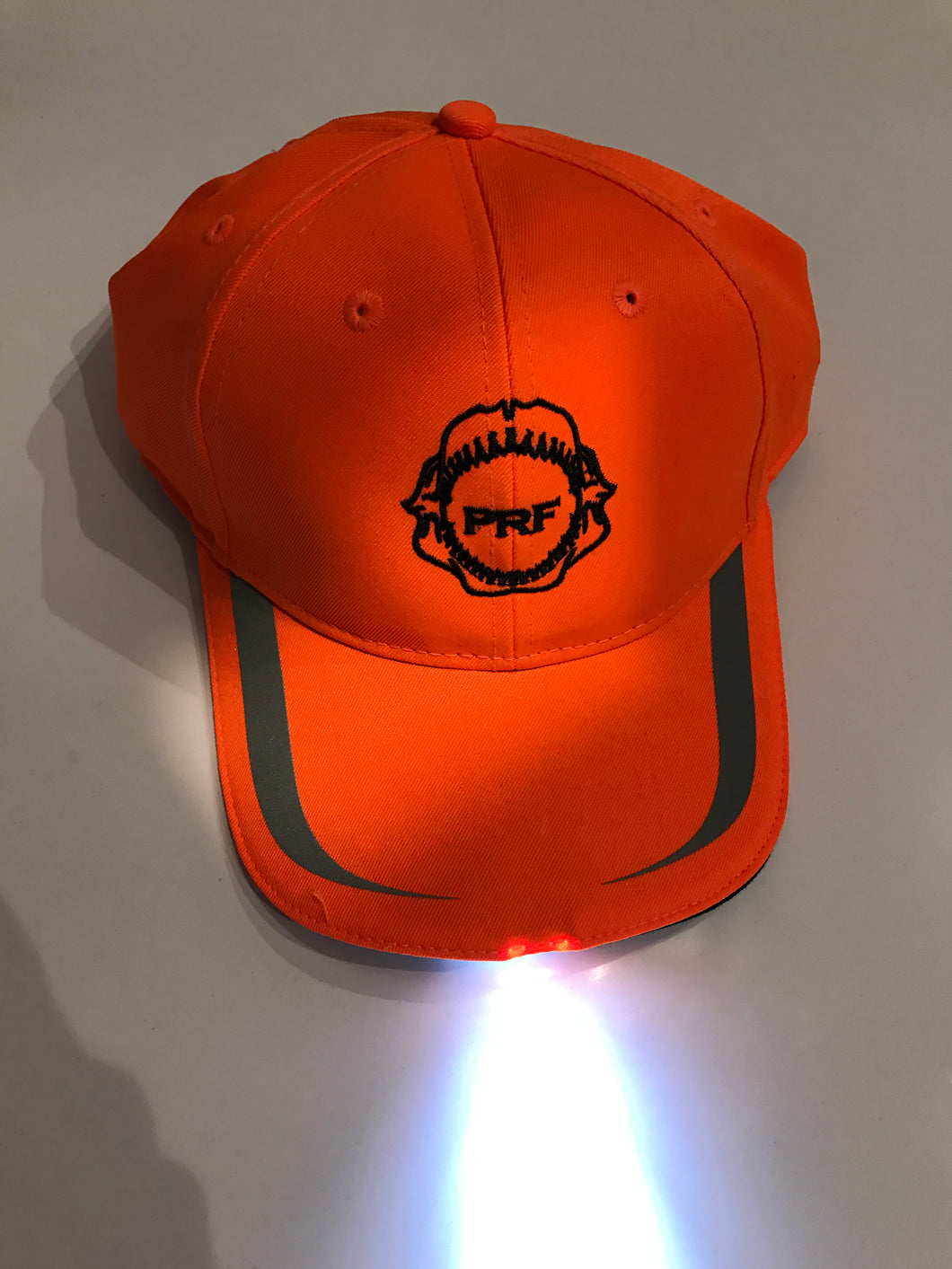 Pre-Order Neon orange hat with built in flashlight